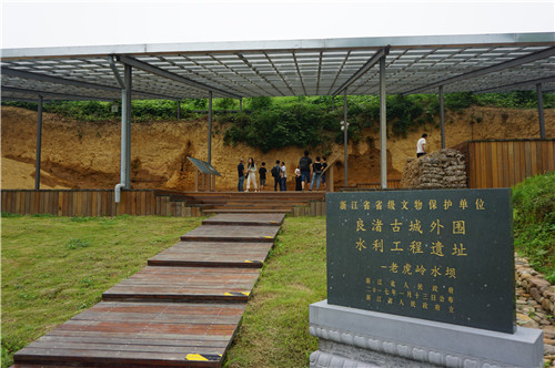 世界由此重新认识一个远古的中国——写在良渚古城遗址申遗成功之际